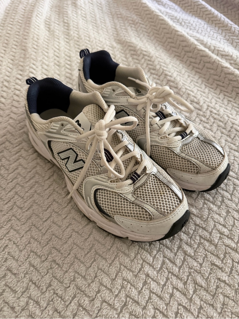New Balance Cream and Navy Athletic Sneakers